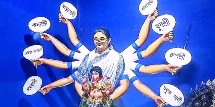 দশভূজা মুখ্যমন্ত্রীর কোলে গনেশ ! তৃণমূলের গনেশ পূজোর মূর্তি ঘিরে বিতর্ক হরিশ্চন্দ্রপুরে