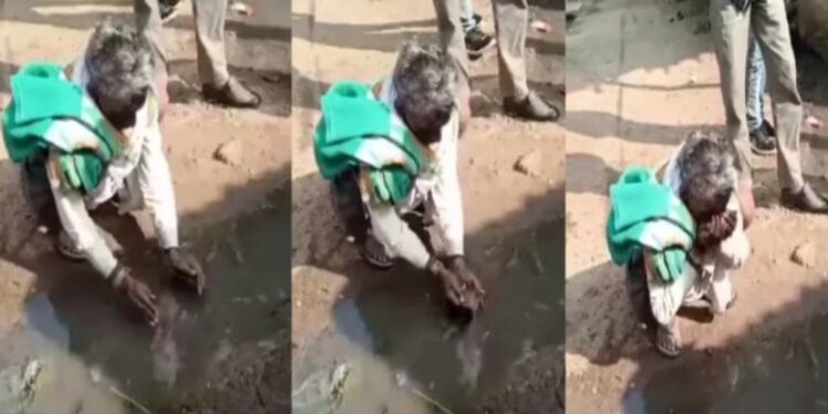 দু’হাজার টাকার শর্তে গ্রামের নিকাশি নালার দূর্গন্ধযুক্ত জল পান করলেন ৬০ বছরের বৃদ্ধ