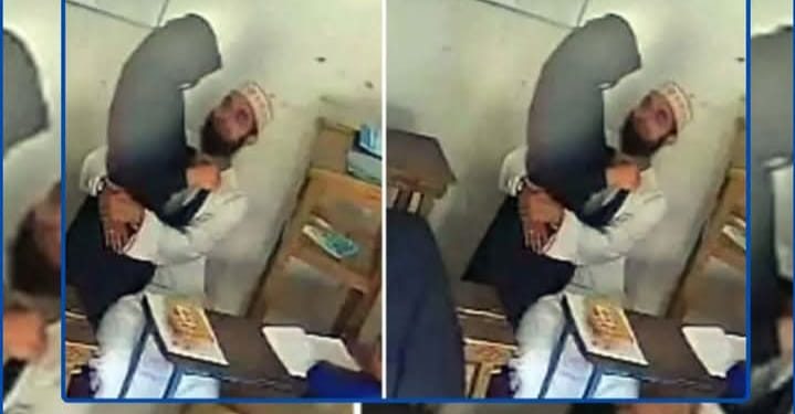 আবাসিক ভবনের ছাদে বোরখা পরা শিক্ষিকাকে কোলে বসিয়ে আদর করছে মাদ্রাসার সুপার, অশ্লীল দৃশ্য দেখে বেদম মার খেতে হল পড়ুয়াকে