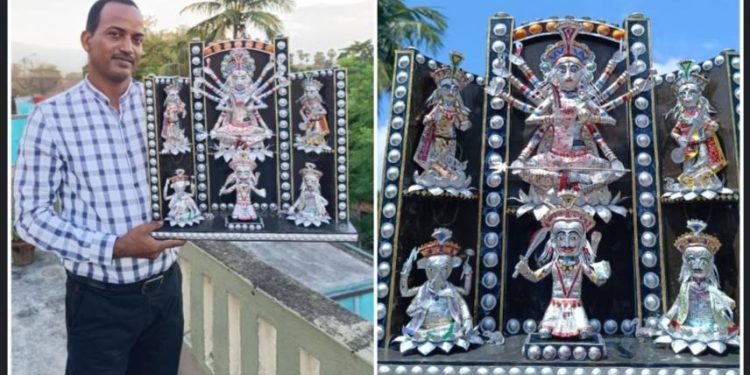 বাতিল এক্সরে প্লেট আর ওষুধের খালি প্যাকেট দিয়ে গুসকরার স্কুল শিক্ষকের তৈরি মডেল দুর্গামূর্তি নজর কেড়েছে এলাকায়