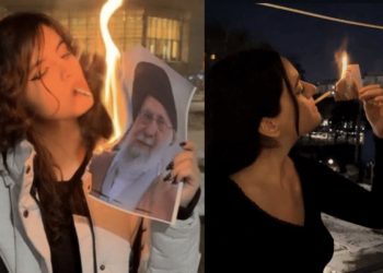 খোলা চুল, মুখে সিগারেট, আলি খামেনির ছবি পুড়িয়ে সিগারেট জ্বালাচ্ছেন তরুনী ; ইরানে সর্বোচ্চ ধর্মীয় নেতার বিরুদ্ধে ঘৃণা চরম সীমায় পৌঁছে গেছে 